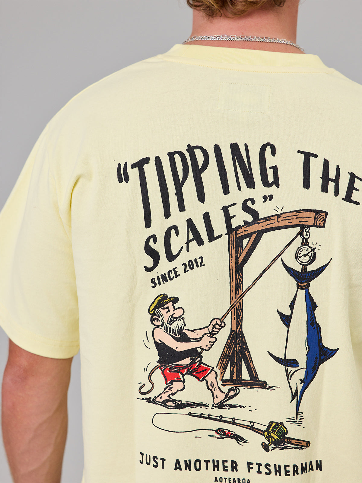 Tipping the Scales Sea Tee Dawn Yellow detail