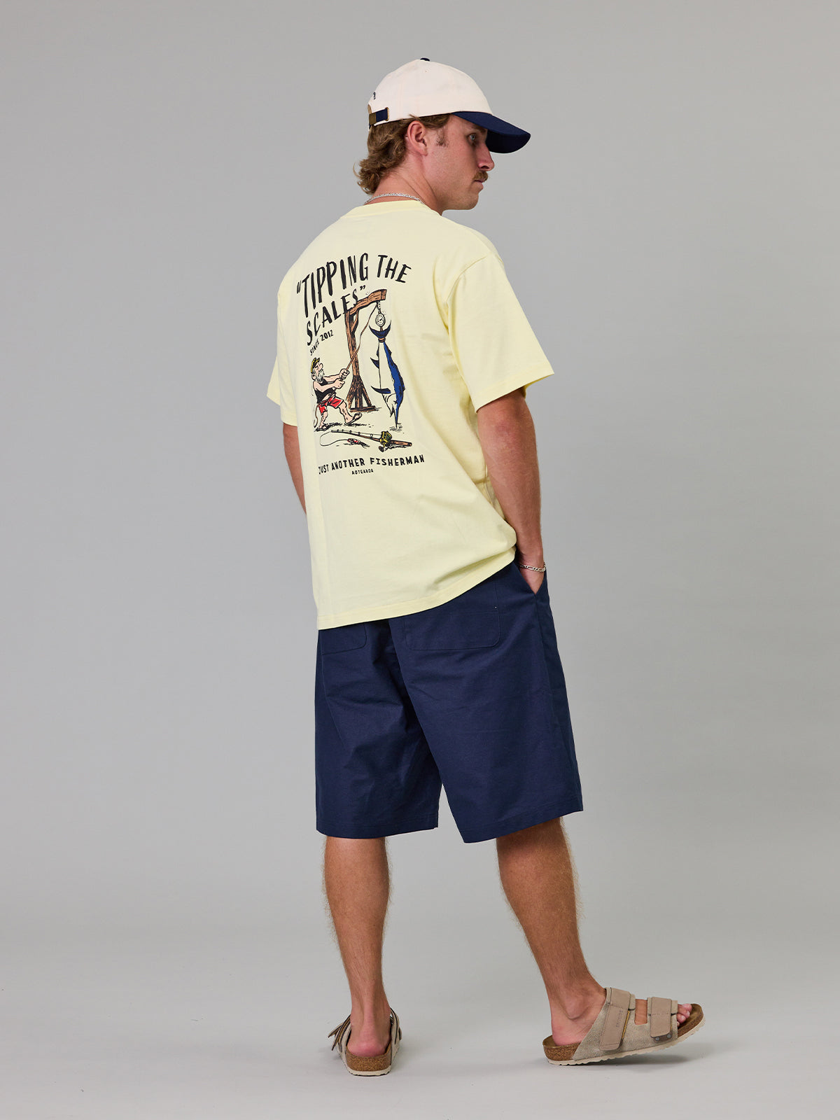 Tipping the Scales Sea Tee Dawn Yellow worn